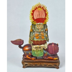 A Chinese Carved and Painted  Ivory Deity Statue