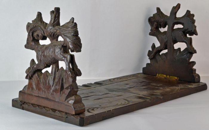 A Carved Black Forest Hunting Theme Bookend