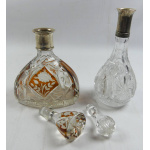 Two Silver Top Decanters